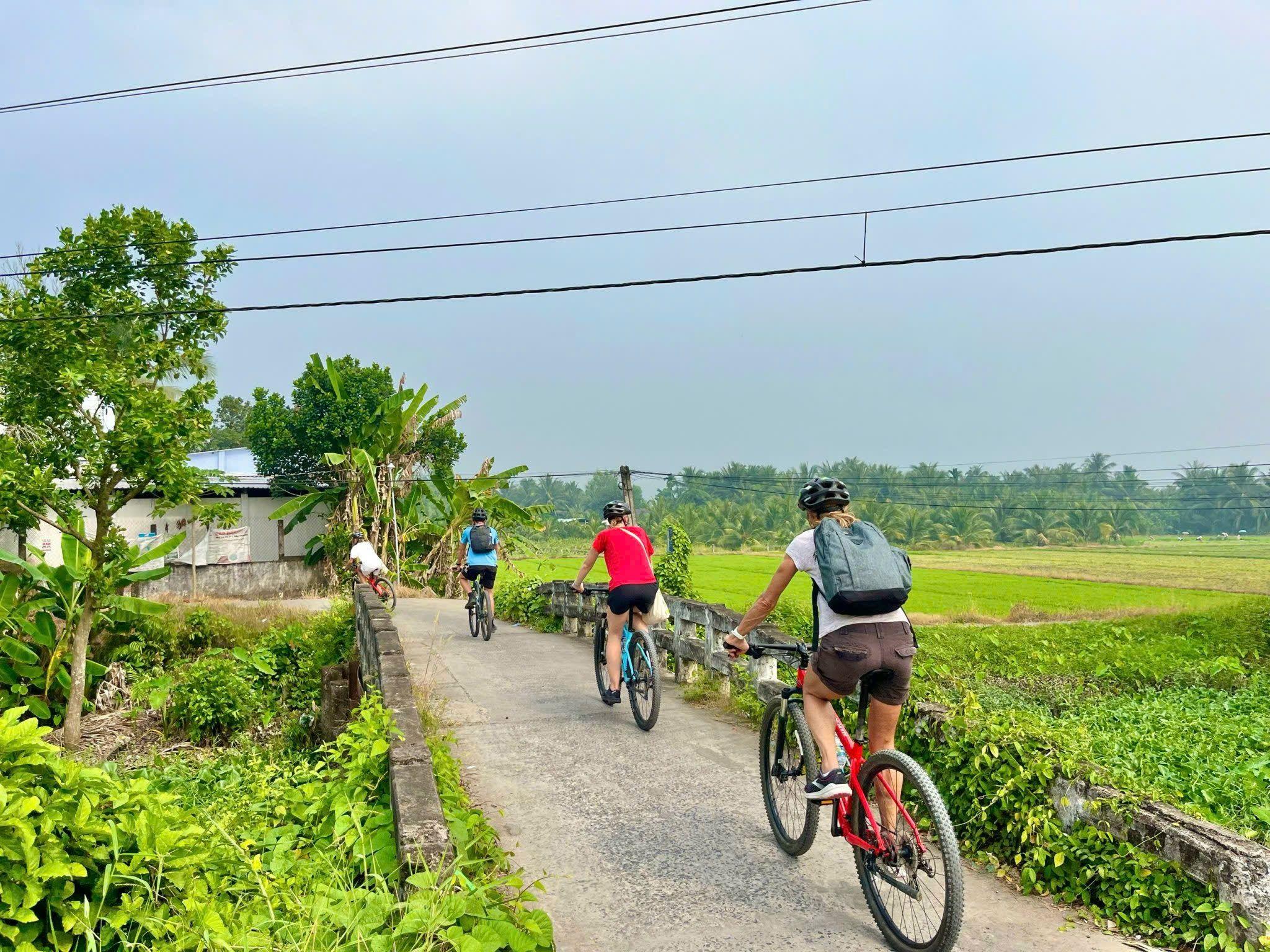 Mekong Delta Day Tour by Bike – Authentic Rural Vietnam